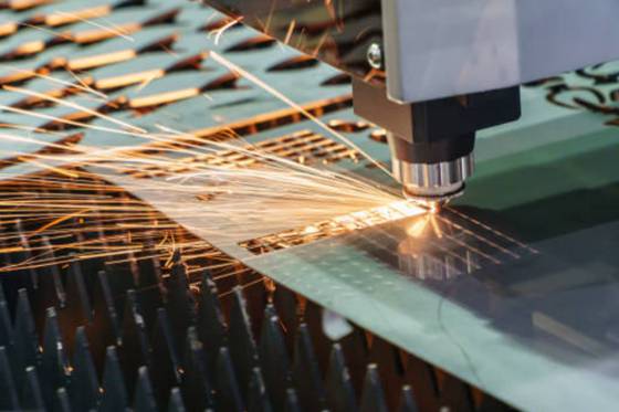 A cnc laser cutter precisely cuts metal sheets with a laser beam